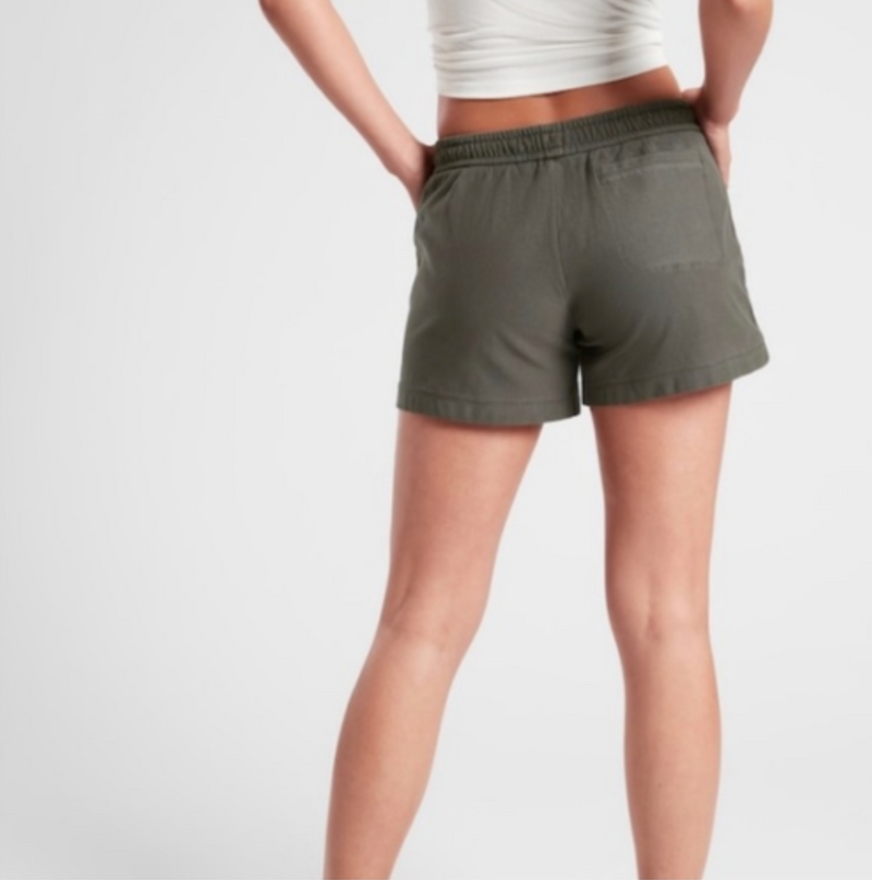 Athleta Cypress Green Elastic Waist Zipper Pockets Farallon Shorts